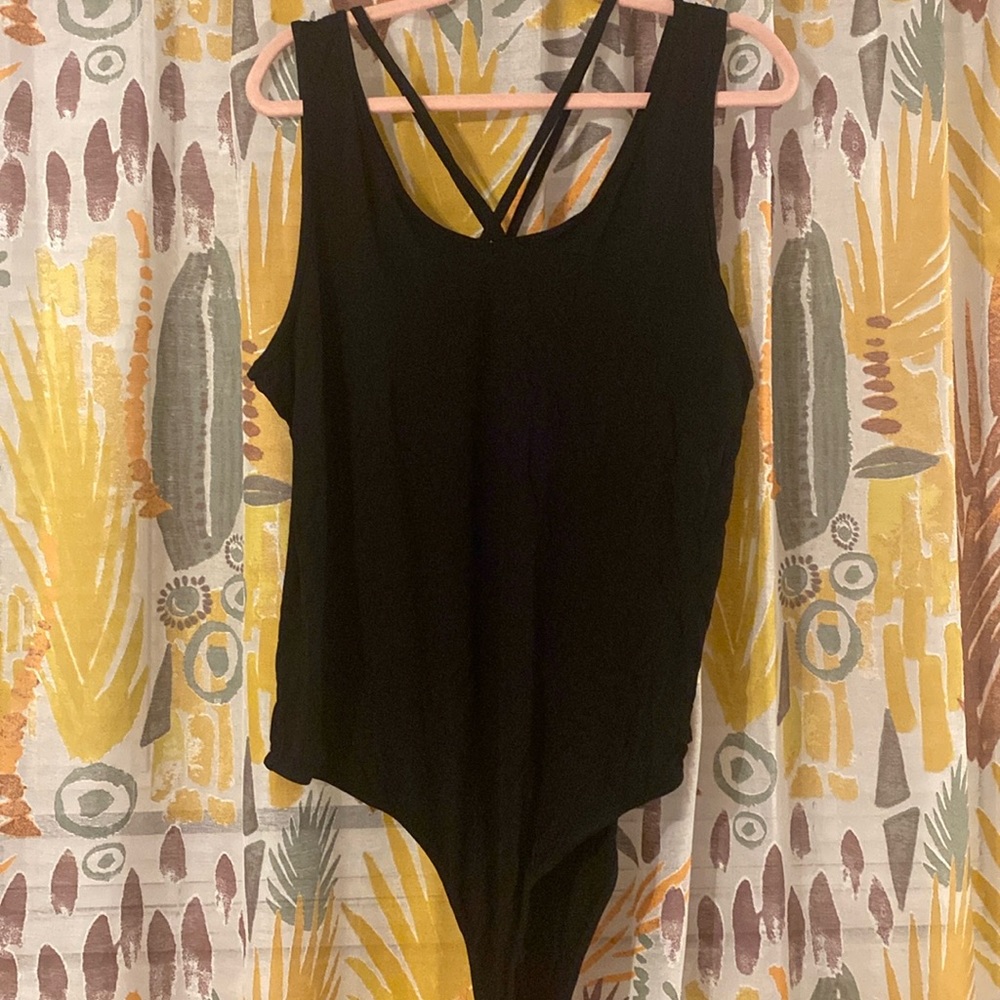 Black Torrid bodysuit.